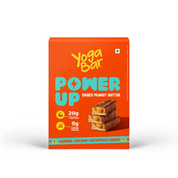 Box of Yoga Bar Power Up Choco Peanut Butter protein bars, highlighting 20g protein and 0g added sugar on the package.