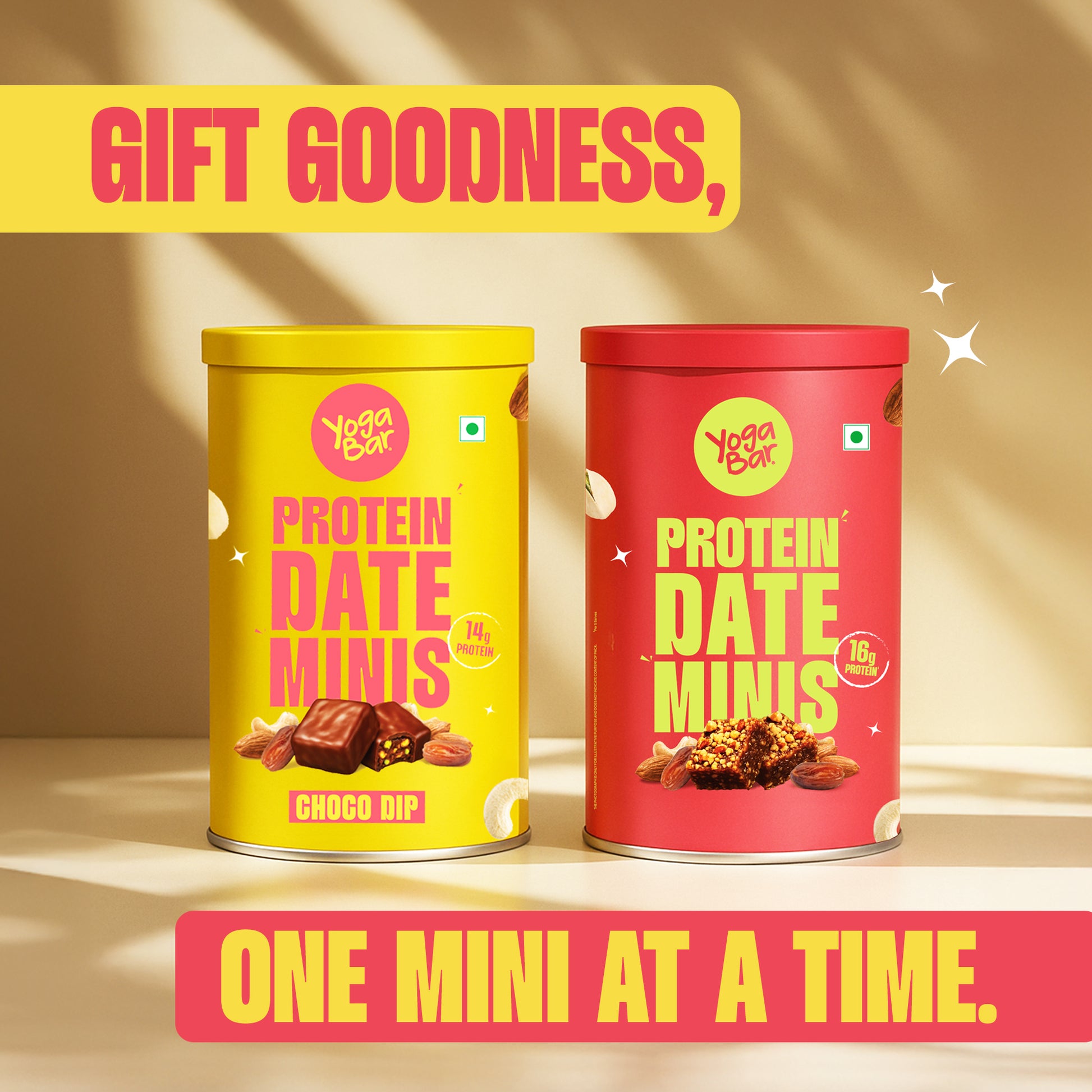 Yoga Bar healthy chocolate snack gift combo showing different variants of Protein Date Minis tins with whole almonds and cashews scattered around