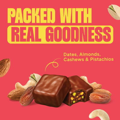 Yoga Bar Choco Dip Protein Date Minis on a pink background highlighting real ingredients like dates, almonds, cashews, and pistachios