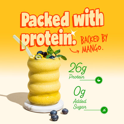 Thick mango protein smoothie glass with mint and blueberries on top highlighting 26g protein and 0g added sugar by Yoga Bar