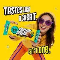 Woman holding Yoga Bar Protein Wafer Bar Dark Chocolate with 10g protein and 0% maida guilt-free crunchy snack bar